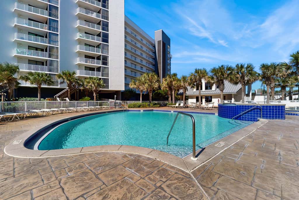 Spacious beachfront condo with full kitchen, shared pool and beach access