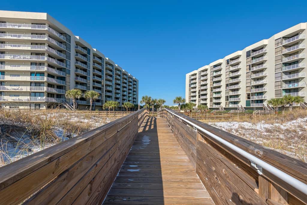 Spacious beachfront condo with full kitchen, shared pool and beach access