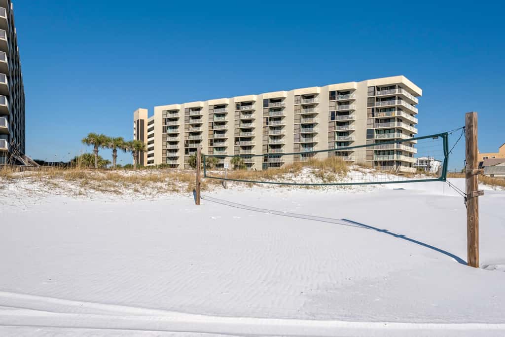Spacious beachfront condo with full kitchen, shared pool and beach access