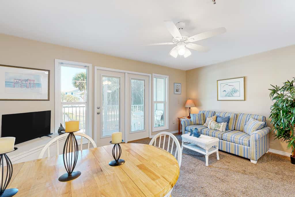 Sunny condo with pool, hot tub, pool views, balcony, & AC
