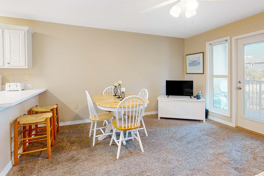 Sunny condo with pool, hot tub, pool views, balcony, & AC