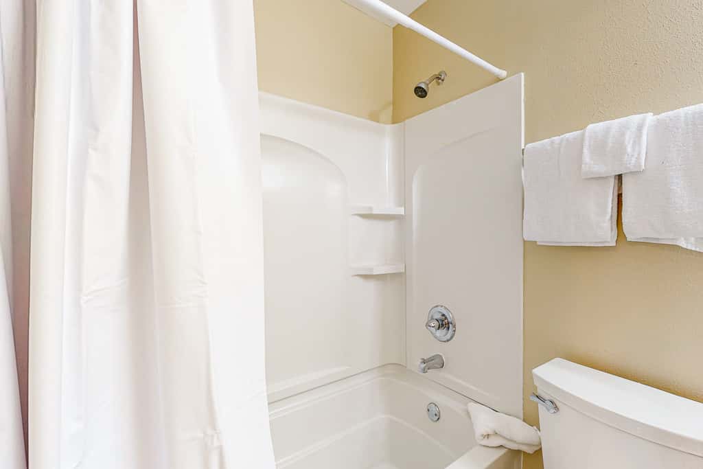 Sunny condo with pool, hot tub, pool views, balcony, & AC