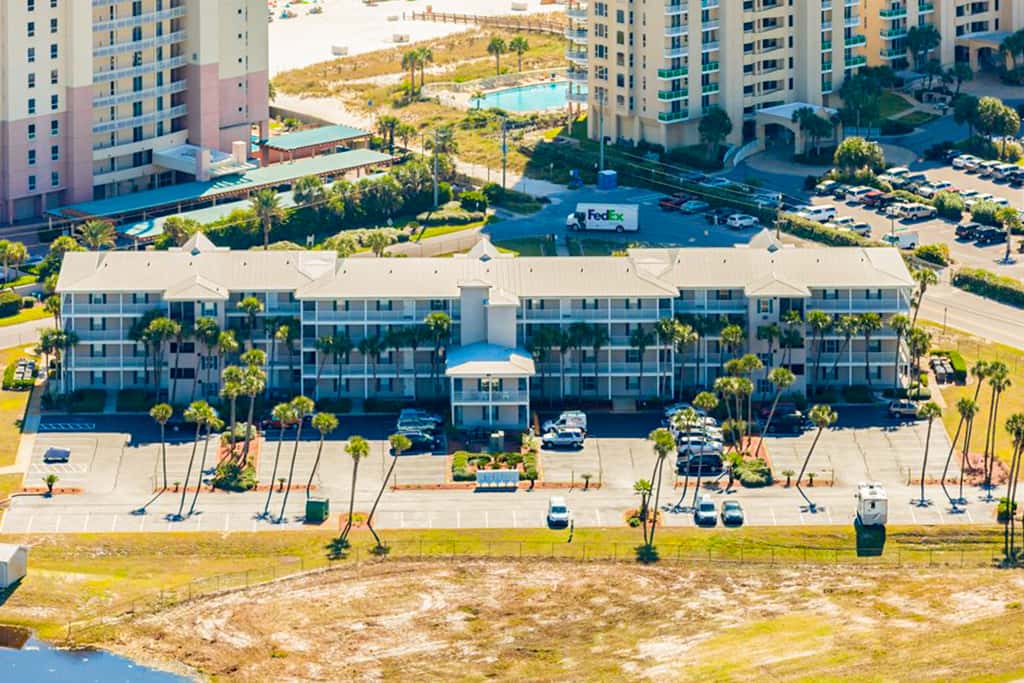 Sunny condo with pool, hot tub, pool views, balcony, & AC