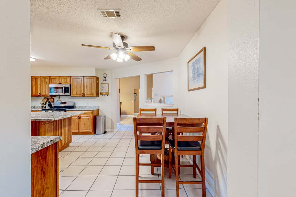 Inviting  dog-friendly home with pool, hot tub, enclosed yard, & WD