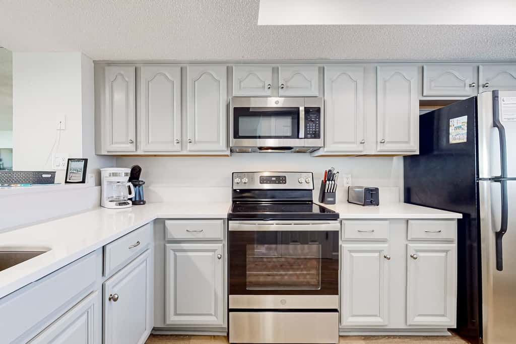 Gorgeious beachview condo with large balcony & shared pool