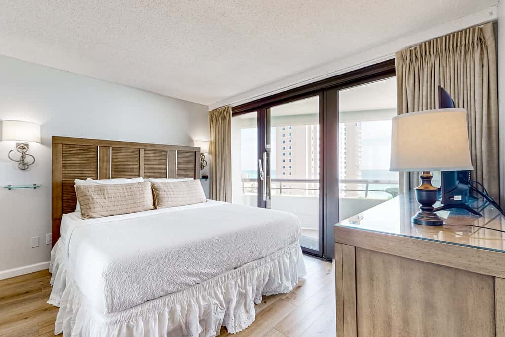 Gorgeious beachview condo with large balcony & shared pool
