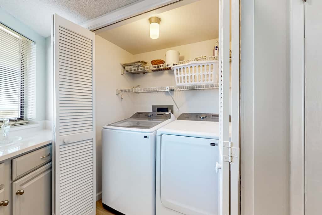 Gorgeious beachview condo with large balcony & shared pool