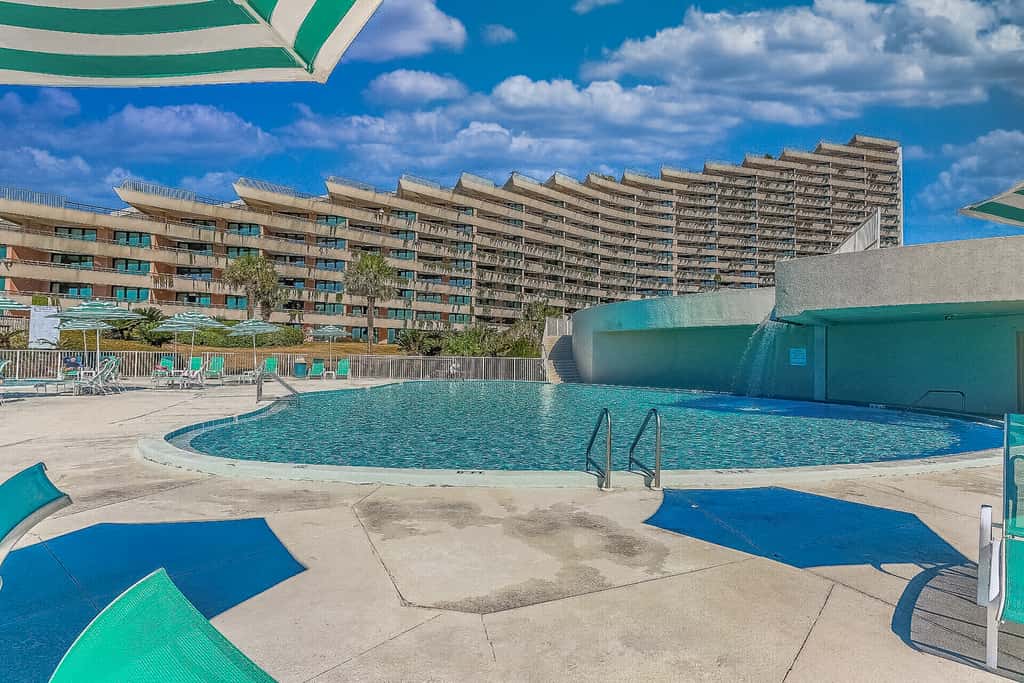 Gorgeious beachview condo with large balcony & shared pool