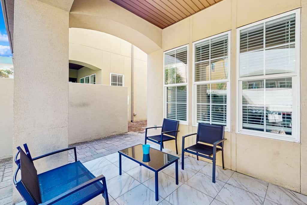 Contemporary coastal townhome with on-site pool/beach access & private patio