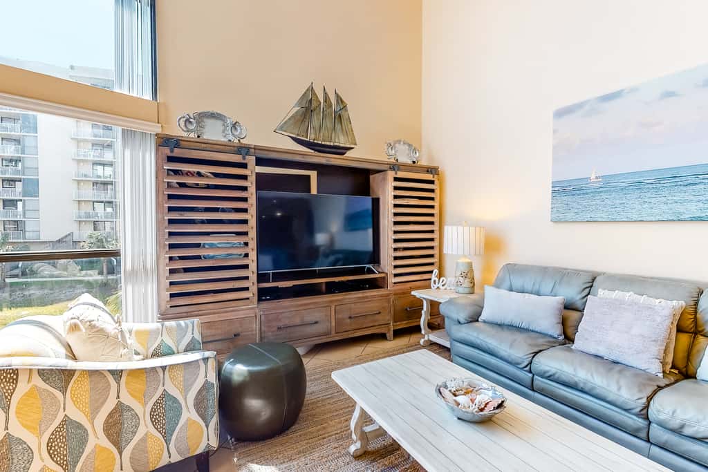 Spacious, beachfront home with shared outdoor pool, hot tub, & beach access
