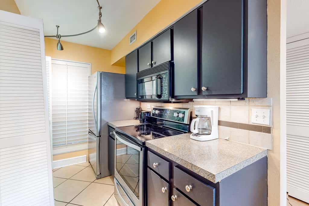 Spacious, beachfront home with shared outdoor pool, hot tub, & beach access