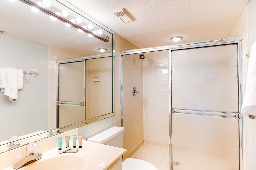 Spacious, beachfront home with shared outdoor pool, hot tub, & beach access