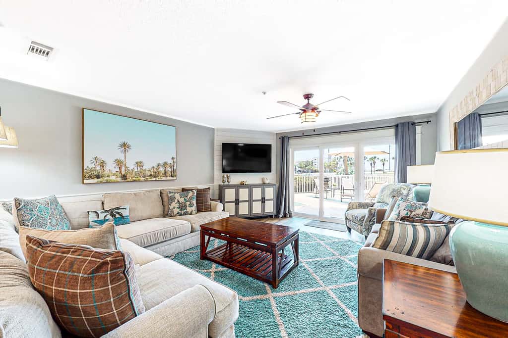 Ground-floor condo with large patio, pools, tennis, & parking - steps to beach