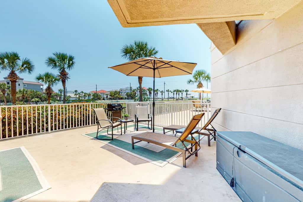 Ground-floor condo with large patio, pools, tennis, & parking - steps to beach