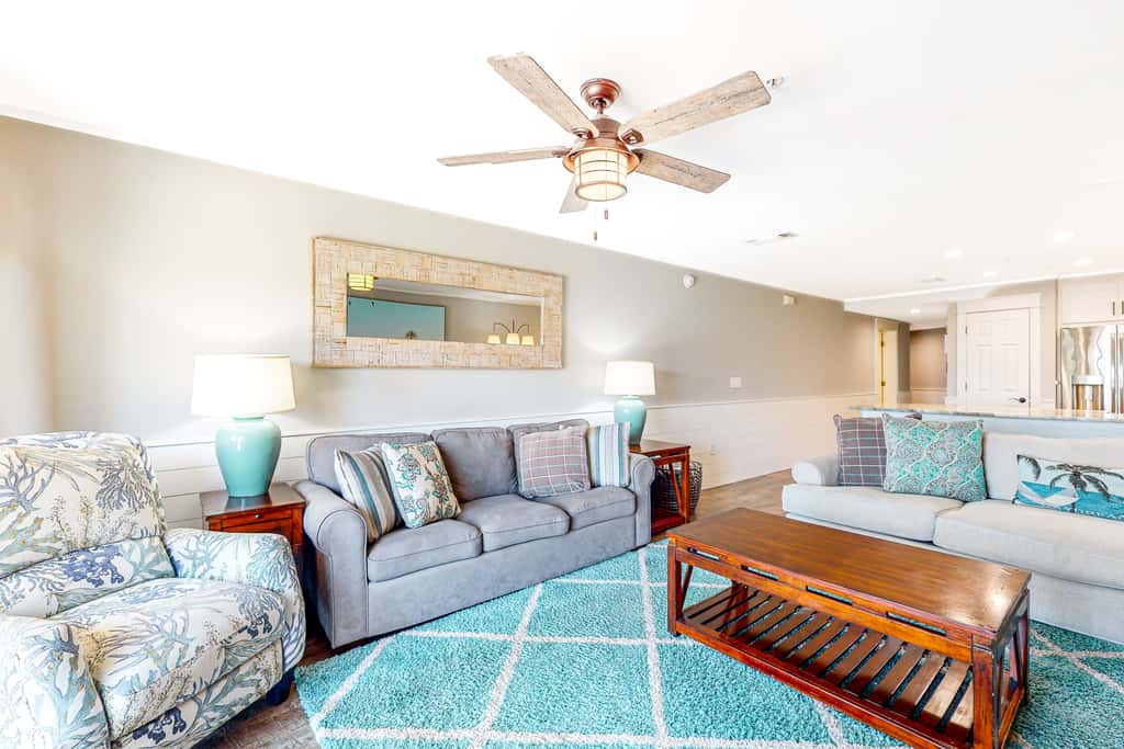 Ground-floor condo with large patio, pools, tennis, & parking - steps to beach