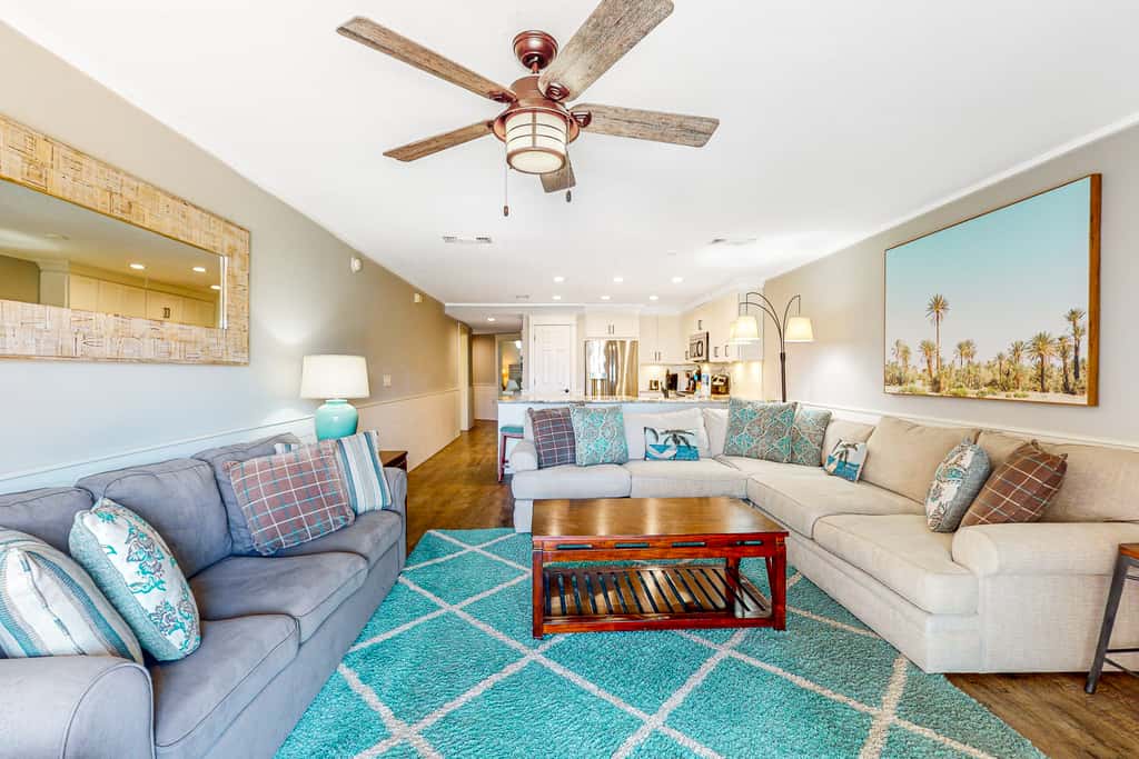 Ground-floor condo with large patio, pools, tennis, & parking - steps to beach