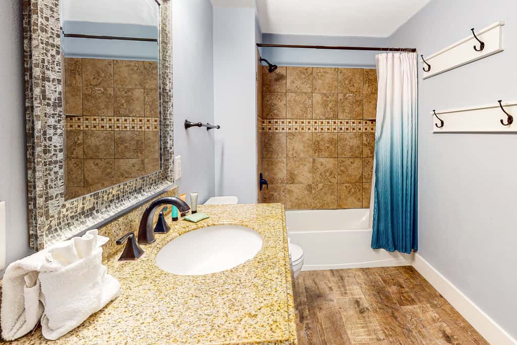 Ground-floor condo with large patio, pools, tennis, & parking - steps to beach