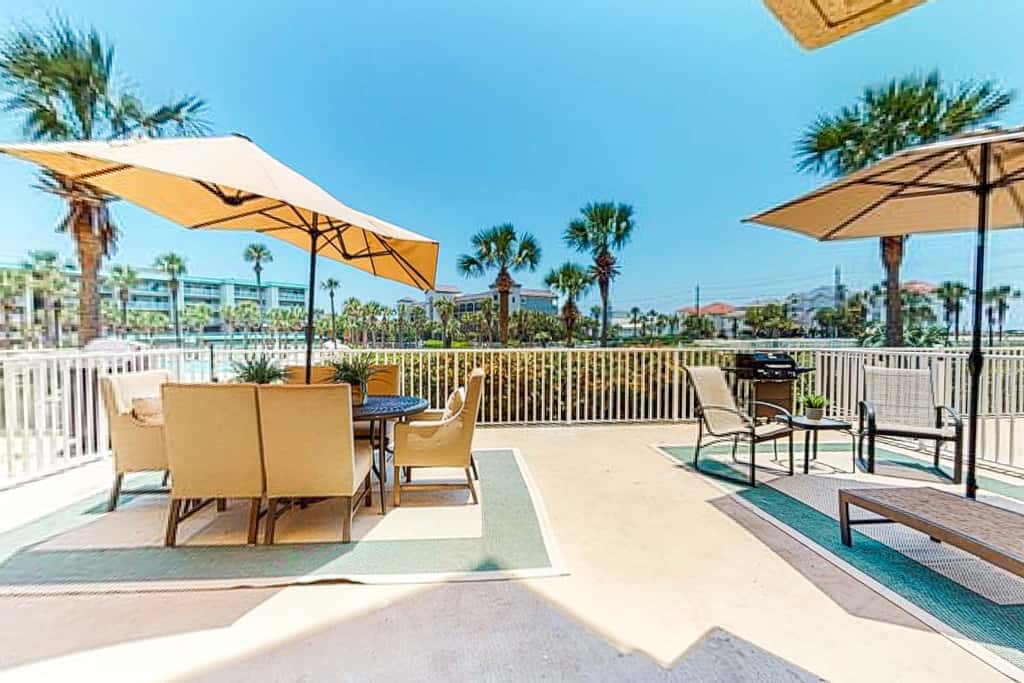 Ground-floor condo with large patio, pools, tennis, & parking - steps to beach
