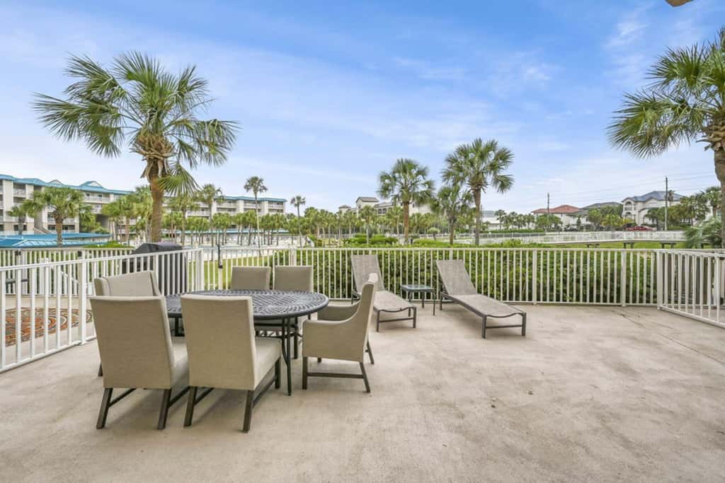 Ground-floor condo with large patio, pools, tennis, & parking - steps to beach