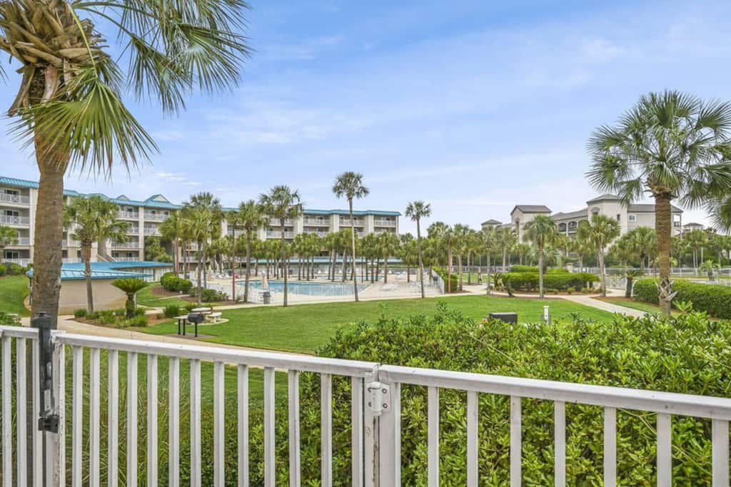 Ground-floor condo with large patio, pools, tennis, & parking - steps to beach