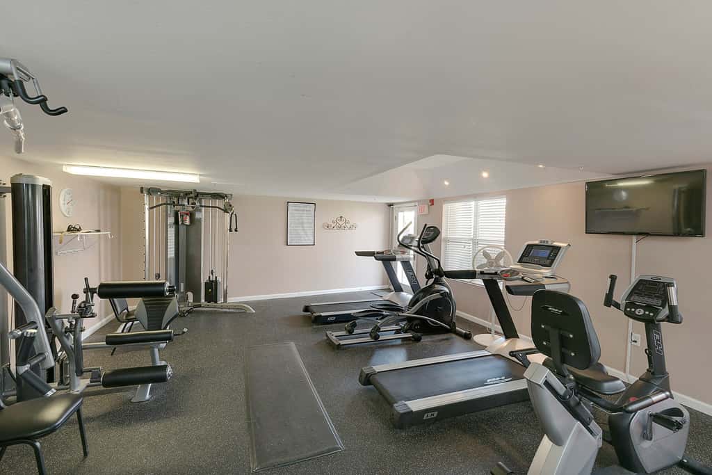 Ground-floor condo with large patio, pools, tennis, & parking - steps to beach