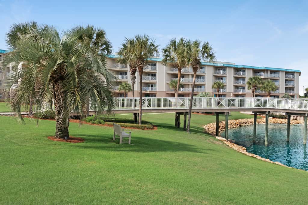 Ground-floor condo with large patio, pools, tennis, & parking - steps to beach
