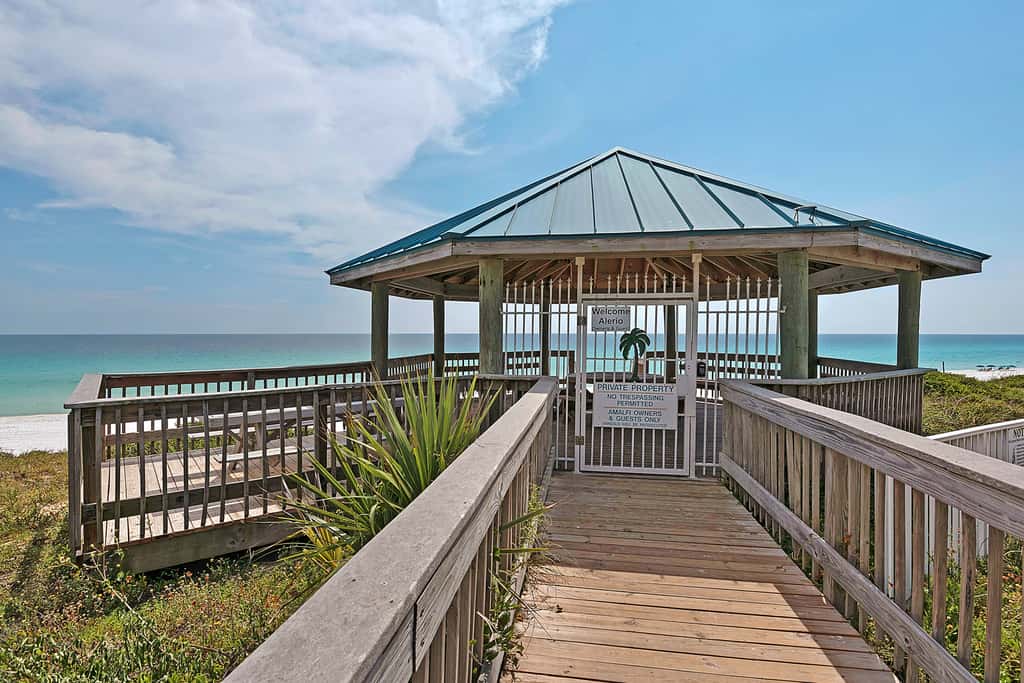 Ground-floor condo with large patio, pools, tennis, & parking - steps to beach