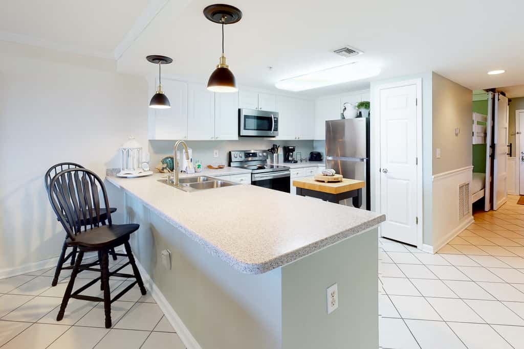 Ocean view condo with high-speed WiFi, balcony, shared pool, & beach access