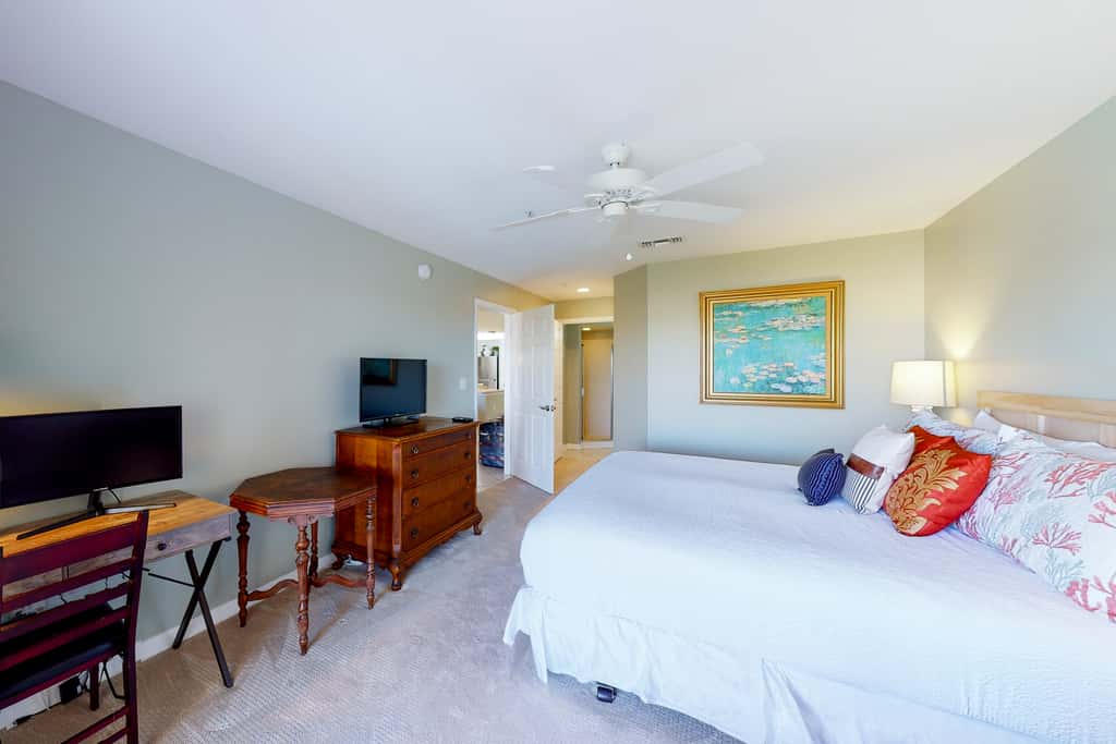Ocean view condo with high-speed WiFi, balcony, shared pool, & beach access