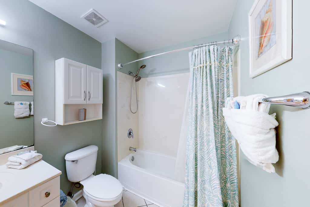 Ocean view condo with high-speed WiFi, balcony, shared pool, & beach access