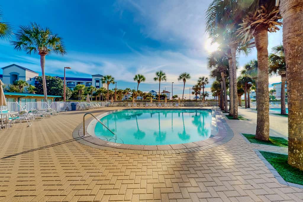 Ocean view condo with high-speed WiFi, balcony, shared pool, & beach access