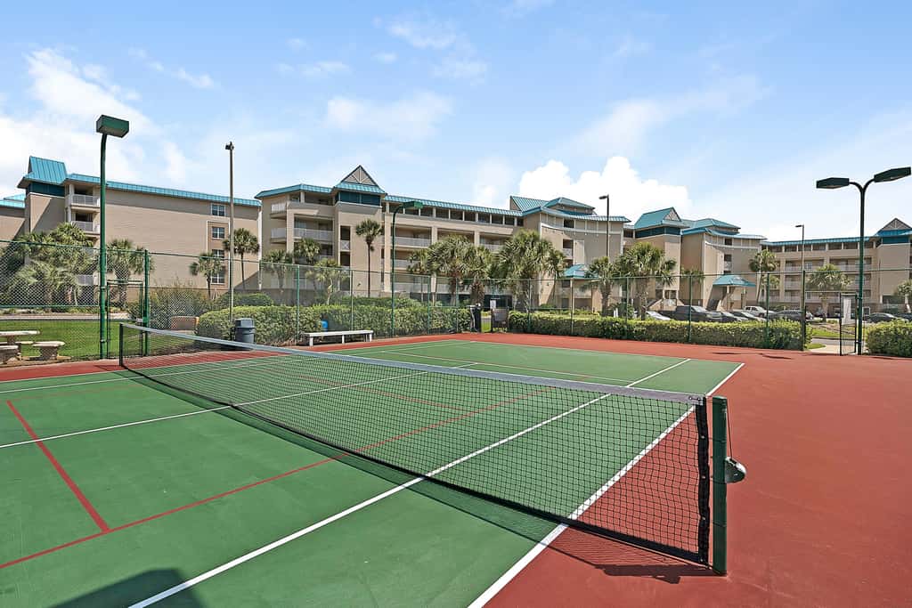 Ocean view condo with high-speed WiFi, balcony, shared pool, & beach access