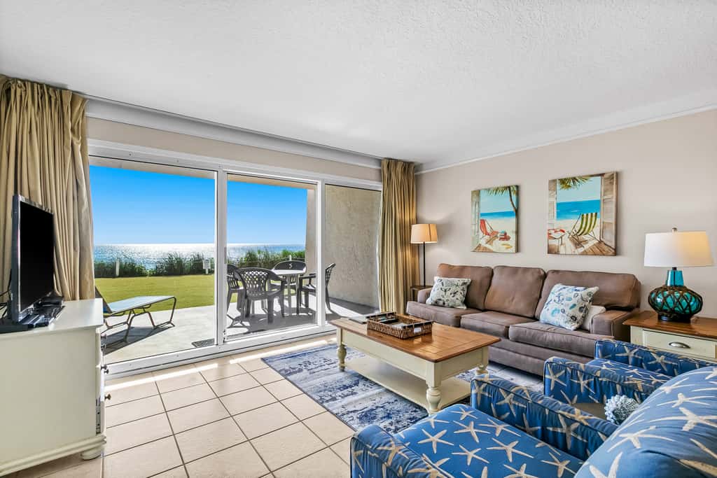 Gulf and beachfront condo with furnished patio, outdoor pool, gym & tennis