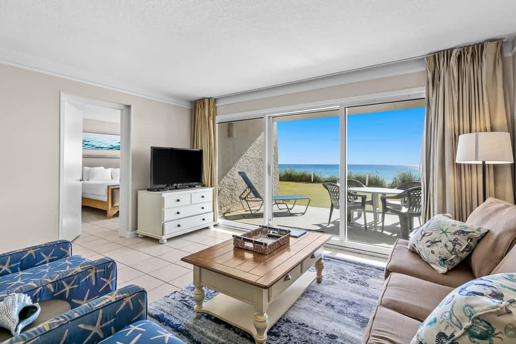 Gulf and beachfront condo with furnished patio, outdoor pool, gym & tennis