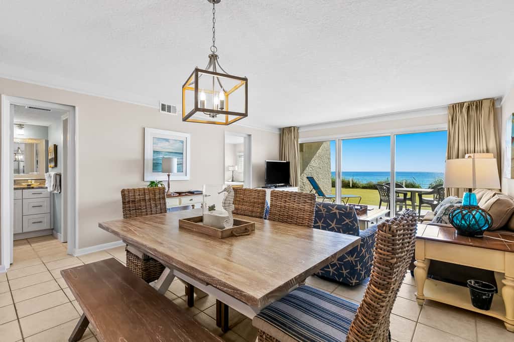 Gulf and beachfront condo with furnished patio, outdoor pool, gym & tennis