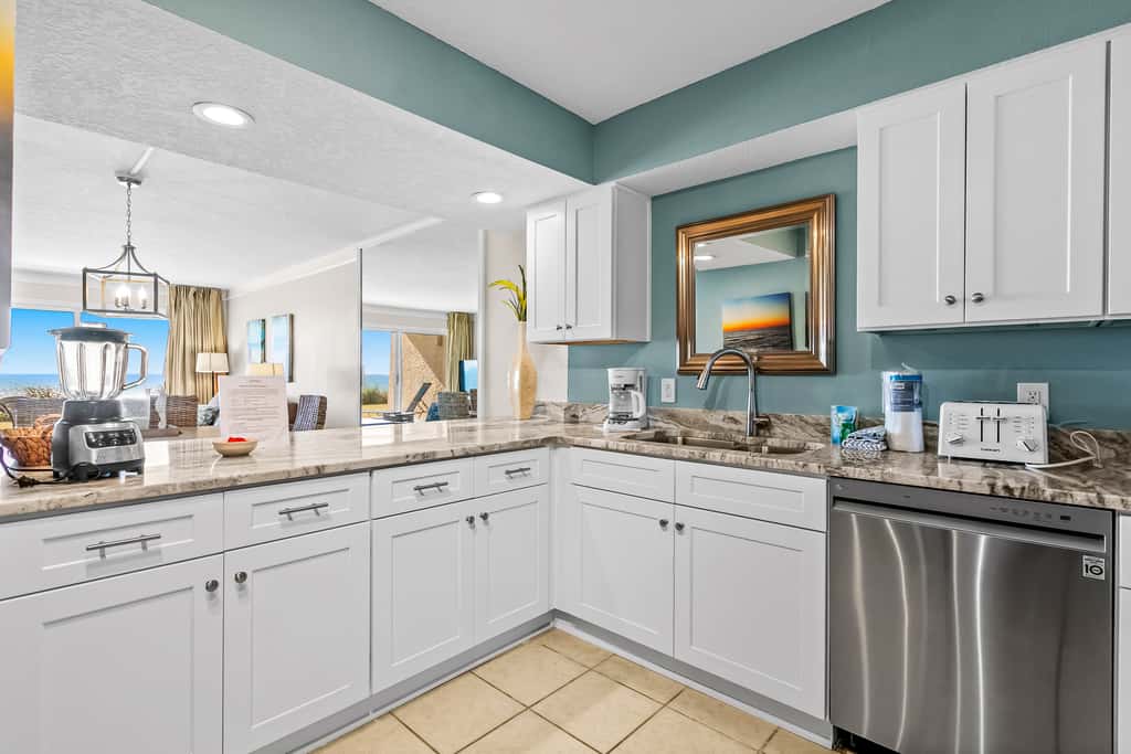 Gulf and beachfront condo with furnished patio, outdoor pool, gym & tennis