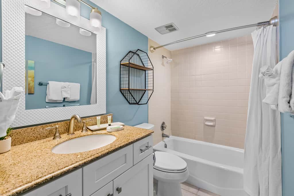 Gulf and beachfront condo with furnished patio, outdoor pool, gym & tennis