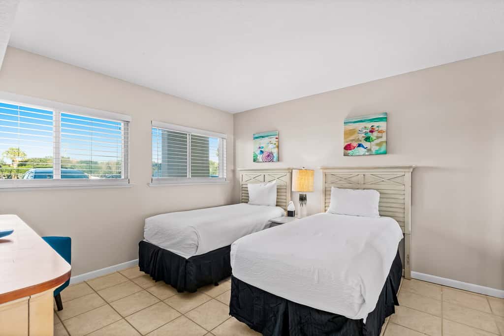 Gulf and beachfront condo with furnished patio, outdoor pool, gym & tennis
