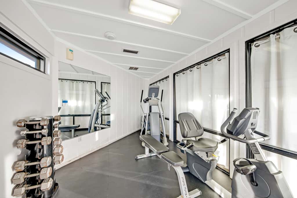 Gulf and beachfront condo with furnished patio, outdoor pool, gym & tennis