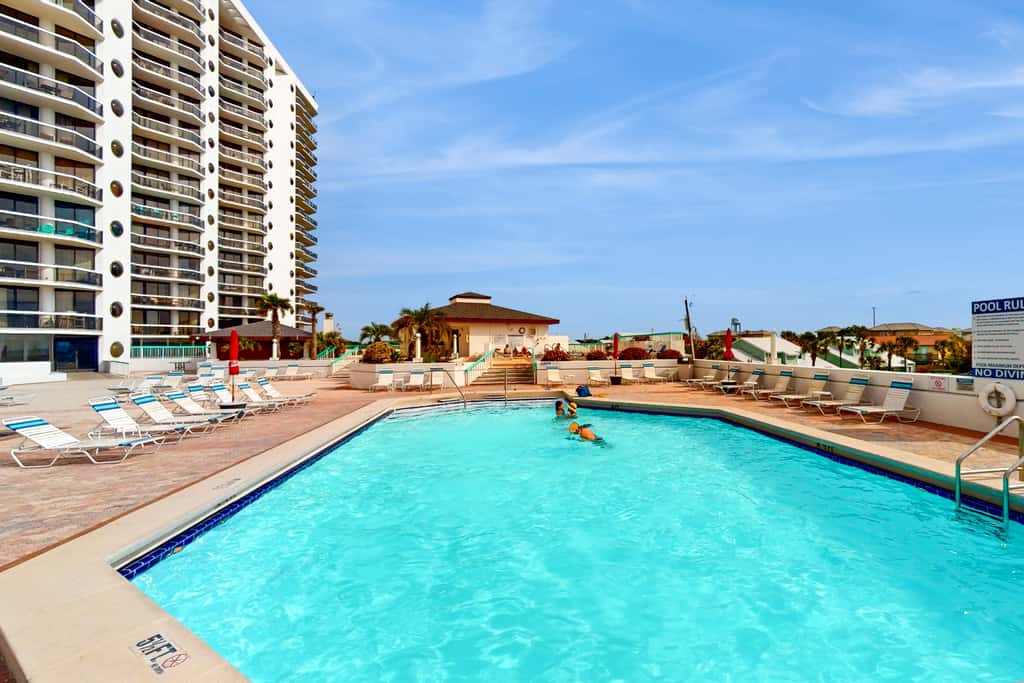 Gulf-view resort condo with pool, hot tubs, & over-street beach access