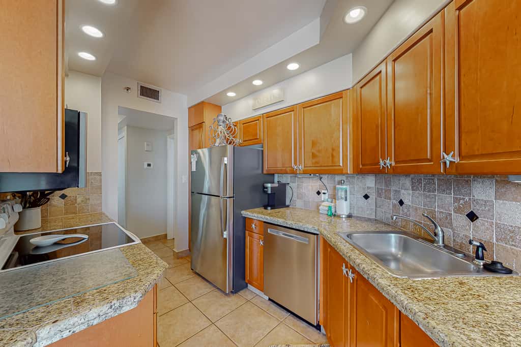 Gulf-view resort condo with pool, hot tubs, & over-street beach access