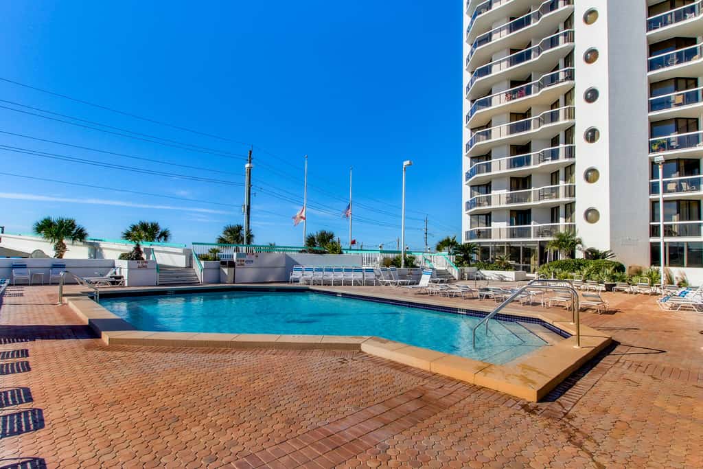 Gulf-view resort condo with pool, hot tubs, & over-street beach access