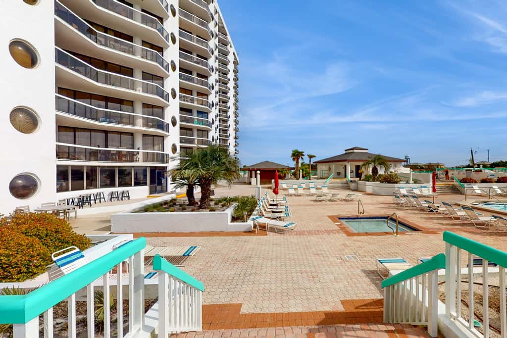 Gulf-view resort condo with pool, hot tubs, & over-street beach access