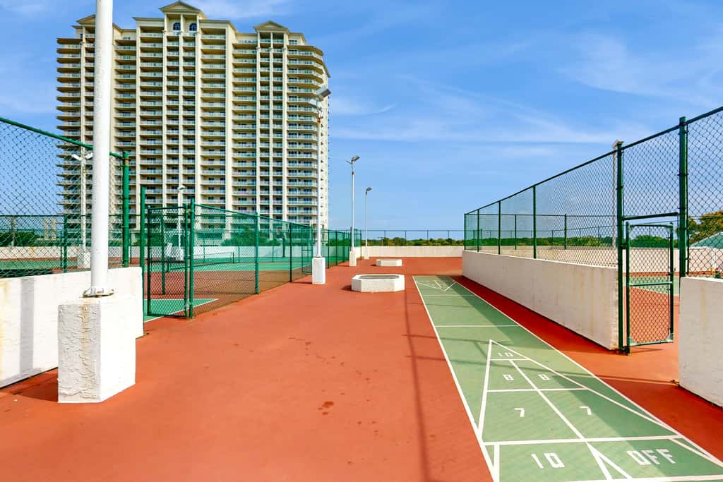 Gulf-view resort condo with pool, hot tubs, & over-street beach access