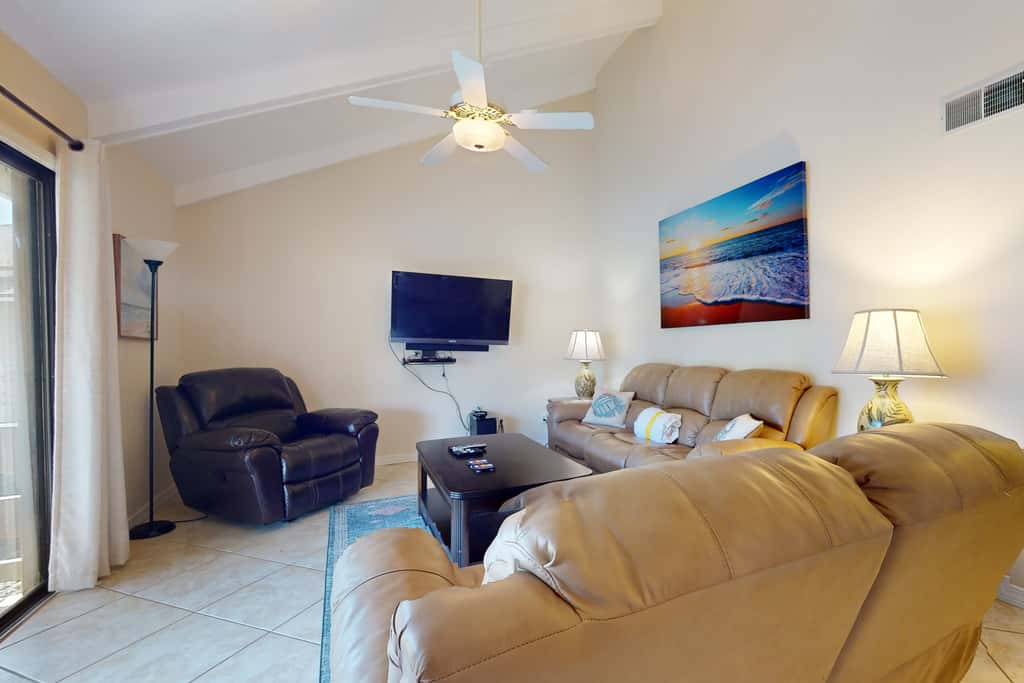 Lakefront condo with on-site golf, pool access, tennis, gym, & balcony