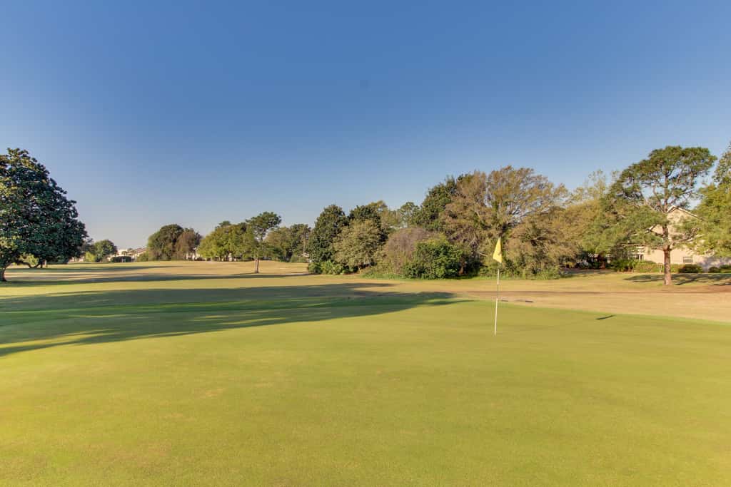 Lakefront condo with on-site golf, pool access, tennis, gym, & balcony