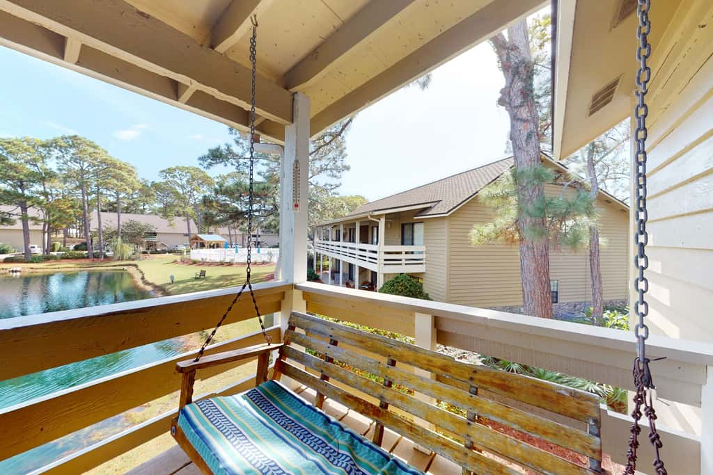 Lakefront condo with on-site golf, pool access, tennis, gym, & balcony