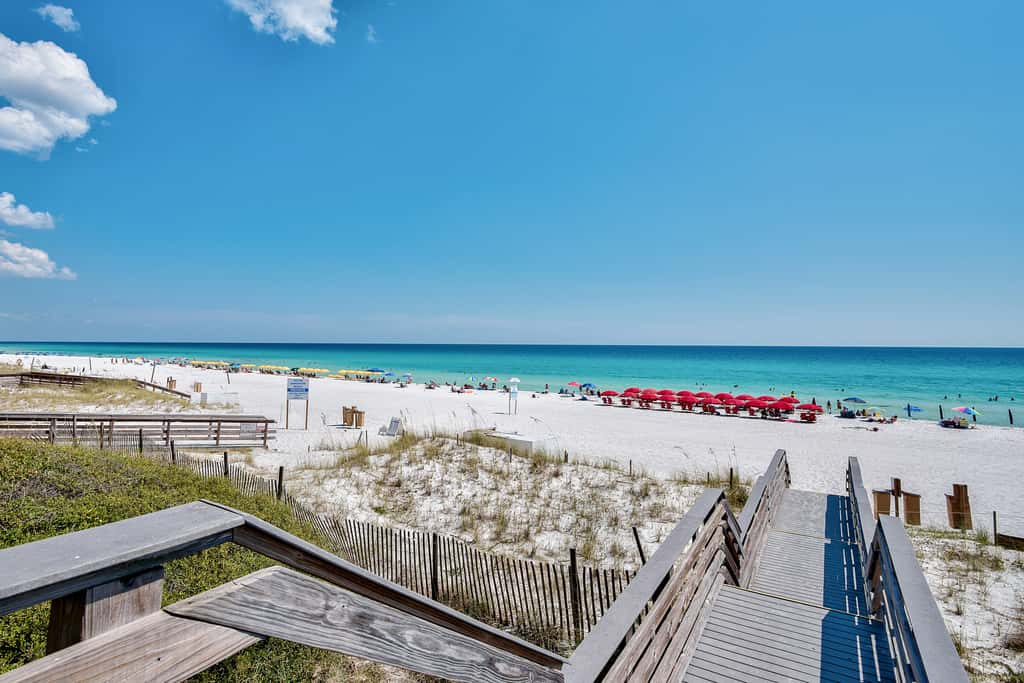 Waterfront townhome with pools, tennis & beach access