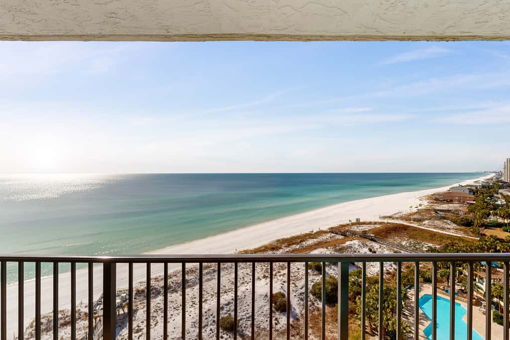 Gulf-front condo with balcony, ocean view, W&D, pool, hot tub & tennis