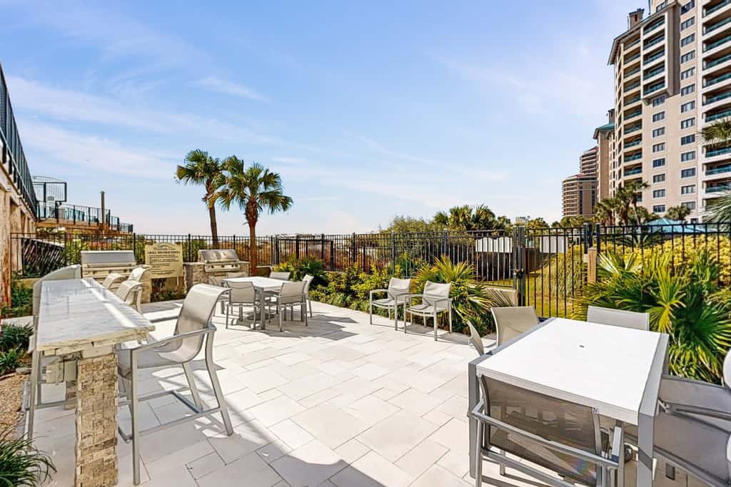 Gulf-front condo with balcony, ocean view, W&D, pool, hot tub & tennis